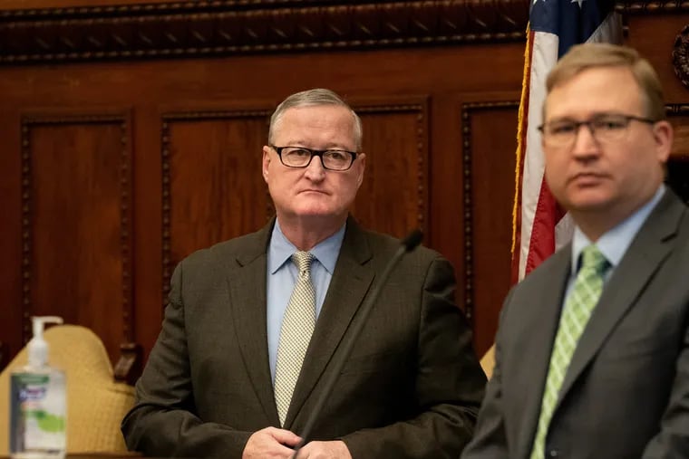 Mayor Jim Kenney, left, and Managing Director Brian Abernathy, right, at a press conference at City Hall in Philadelphia on March 17.
