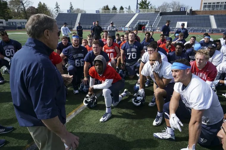 Villanova coach Andy Talley, who is retiring after the upcoming season, addresses his players at the end of practice.