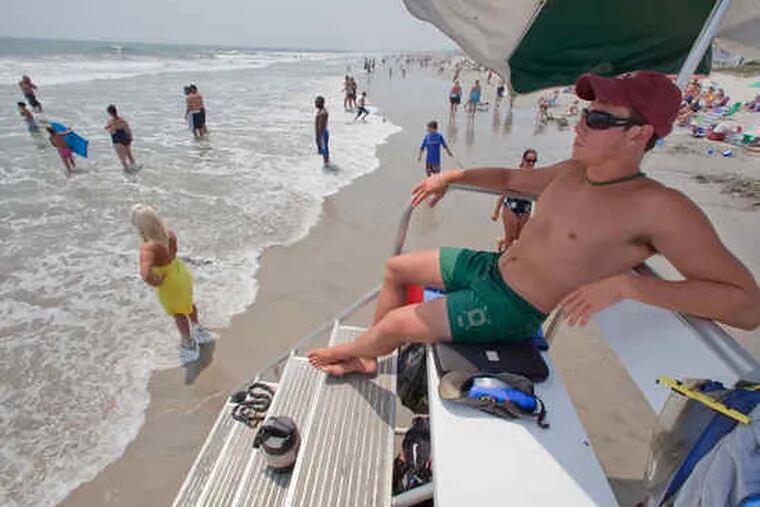Lifeguard Blake Trabuchi-Downey in Sea Isle City, N.J. A national campaign - &quot;Break the Gripof the Rip!&quot; - is telling swimmers how to deal with the currents and follow basic safety rules.