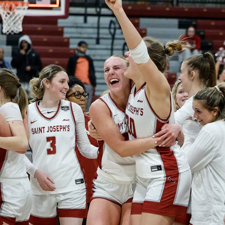 St. Joseph celebrates beating Seton Hall  54-47 advancing to the second round of the WBIT tournament at the The Hagan Arena In Philadelphia, Thursday, March 21, 2024.
