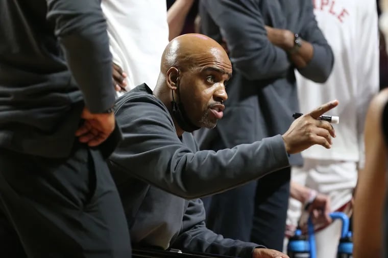 Monté Ross, Temple associate head coach, huddles his team during the game against East Carolina at the Liacouras Center on Jan. 8, 2022.