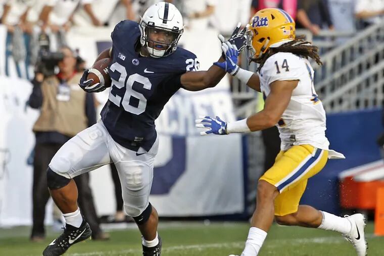 Former Penn State running back tries to stiff arm newly minted Eagles defensive back Avonte Maddox during the most recent installment of the Pitt-Penn State rivalry.