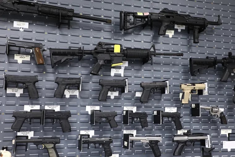 Guns on display at the Full Metal Jacket indoor range in Cape May County. The county is one of many in New Jersey that have declared themselves "gun sanctuaries," particularly since the state passed a "red flag law" allowing the confiscation of guns from people deemed a danger.