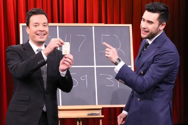 White wowing Jimmy Fallon (left) and the &quot;Tonight Show&quot; audience with his Powerball-ticket trick. White has worked with David Copperfield, David Blaine, and Kanye West.