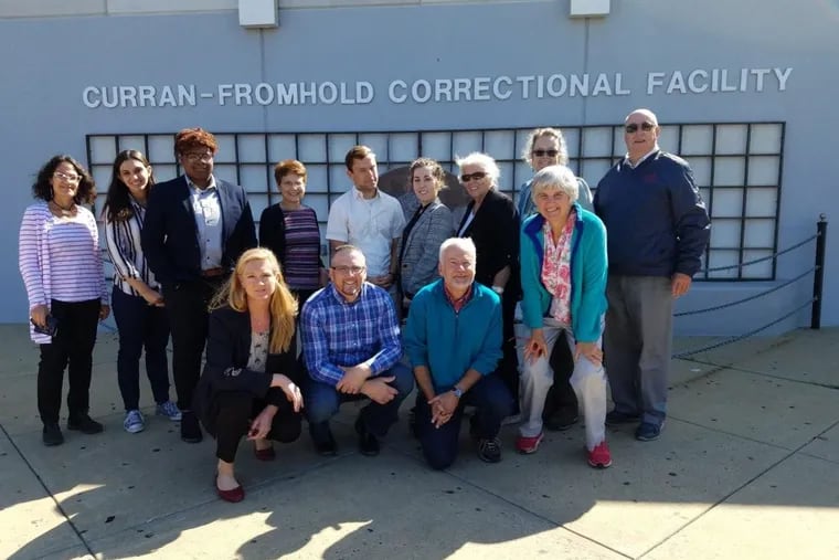 Participants in this fall's Consensus-Building for Incarceration Reduction, a collaboration between Urban Rural Action and the Pennsylvania Prison Society, gather in front of Philadelphia's Curran-Fromhold Correctional Facility.