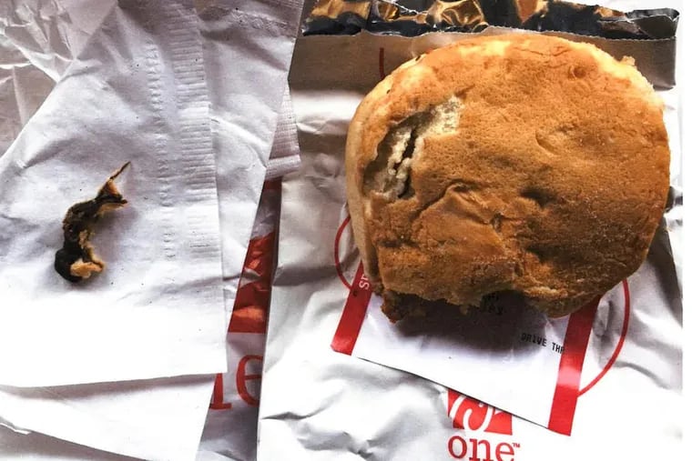 A photo taken of the dead rodent and bun, which had been part of a chicken sandwich bought from a Chick-fil-A restaurant in Langhorne, Bucks County, on Nov. 25, 2016.
