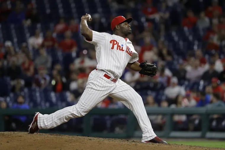 Hector Neris in action against the Giants on Tuesday.