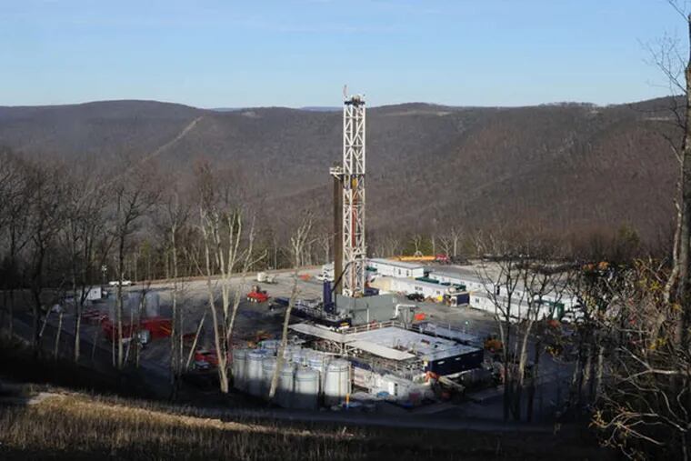 A dispute over the ownership of mineral rights could determine who would profit from drilling operations similar to this well in Loyalsock State Forest.