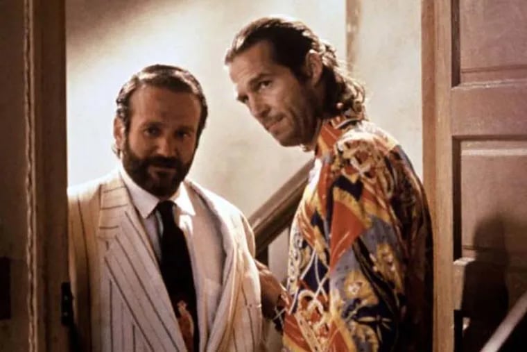 Robin Williams (left) plays Parry, a homeless widower with mental-health issues, in &quot;The Fisher King,&quot; also starring Jeff Bridges as Jack Lucas.