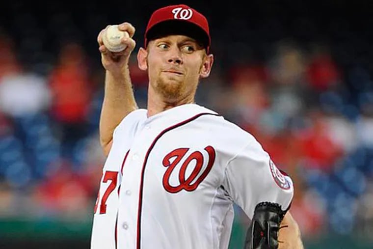 Washington Nationals starting pitcher Stephen Strasburg (37) throws during the first inning against the Philadelphia Phillies at Nationals Park. (Brad Mills/USA Today)