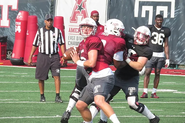 Temple's Anthony Russo steps up in the pocket to throw during Tuesday's preseason practice.