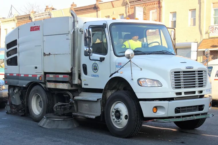In April, as part of a street sweeping pilot, the city will deploy mechanical street sweepers like this one, along with workers armed with leaf blowers to blow trash into the street.