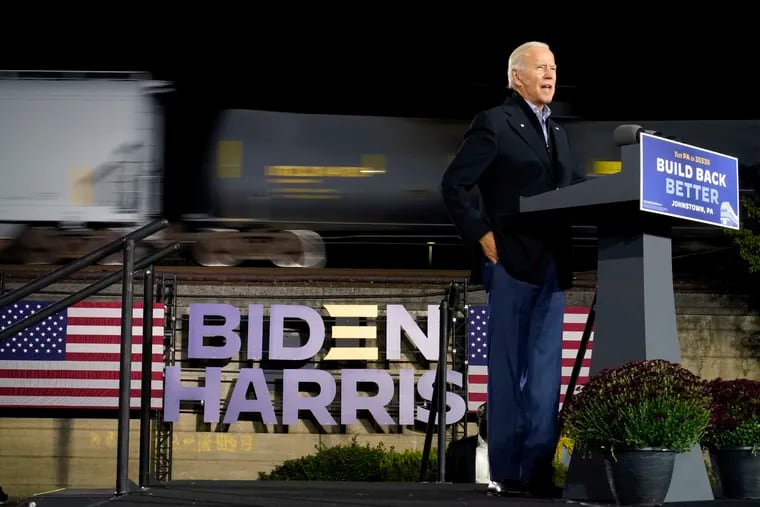 Democratic presidential nominee Joe Biden speaks at the Amtrak train station Wednesday in Johnstown, Pa., at the end of a day-long train tour through Ohio and Pennsylvania.