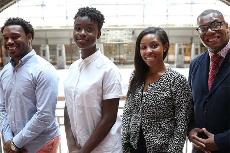 DAVID MAIALETTI / STAFF PHOTOGRAPHER Young members of the NAACP (from left) DeVaun Brown, Danielle Roomes, Lauren Footman and Shawn Aleong.