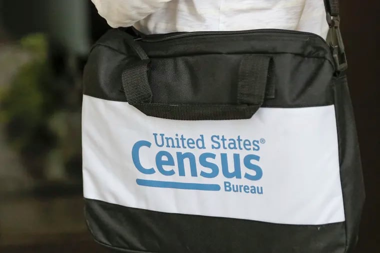 A briefcase of a census taker is seen in August as she knocks on the door of a residence in Winter Park, Fla.