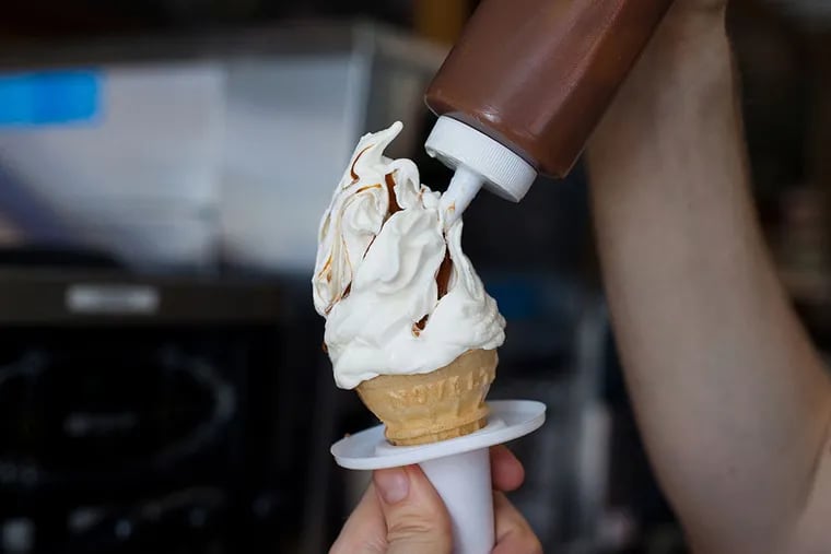 "Salty Pimp" specialty ice cream cone, vanilla soft serve injected with dulce de leche, dipped in chocolate shell and topped with sea salt from Big Gay Ice Cream on South Street east of Broad. (Donny Tsang photo)