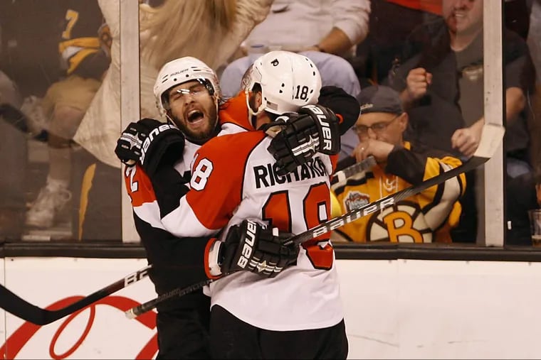 Those were the days: Simon Gagne (left) celebrating what turned out to be the game-winning goal to cap the greatest comeback in Flyers history. The Flyers roared back to beat the Bruins in 2010 after dropping the first three games of their conference semifinal series.