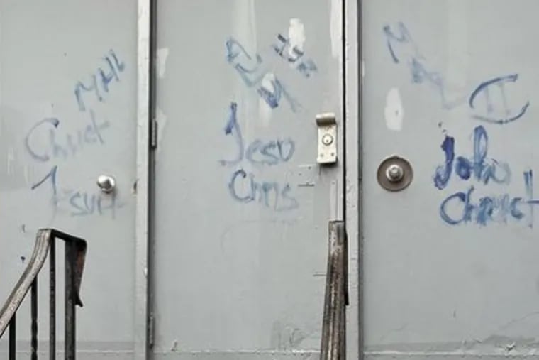 Vandalism on the Masjidullah Center for Human Excellence in Northwest Philadelphia. Security footage captured a suspect painting the mosque on Feb. 24.