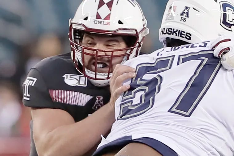 Temple # 58 Matt Hennessy blocks UConn’s # 57 Travis Jones in the first half of the UConn vs. Temple University football game at Lincoln Financial Field in Phila., Pa, on November 30, 2019.