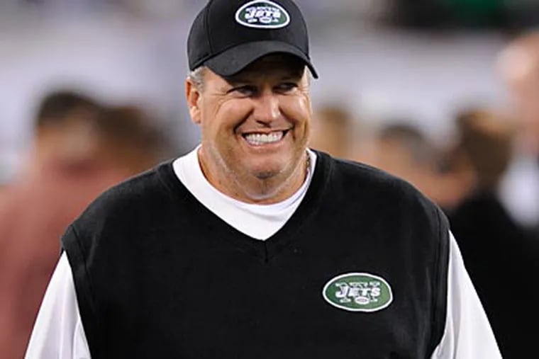 Rex Ryan's Jets travel to Philadelphia to take on the Eagles on Sunday. (Bill Kostroun/AP)