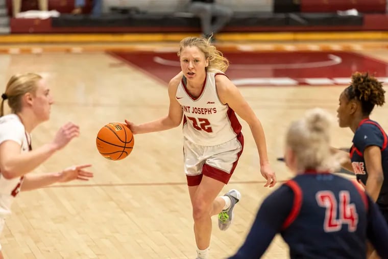St. Joe's grad student Chloe Welch dribbles toward the basket against Duquesne on Jan. 13 at Hagan Arena. Welch has played a huge role in the Hawks' run through the Big 5 and strong start to A-10 play.