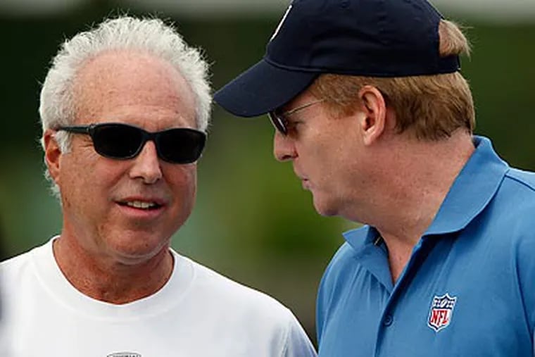 Eagles owner Jeffrey Lurie speaks with NFL Commissioner Roger Goodell during training camp. (David Maialetti/Staff Photographer)