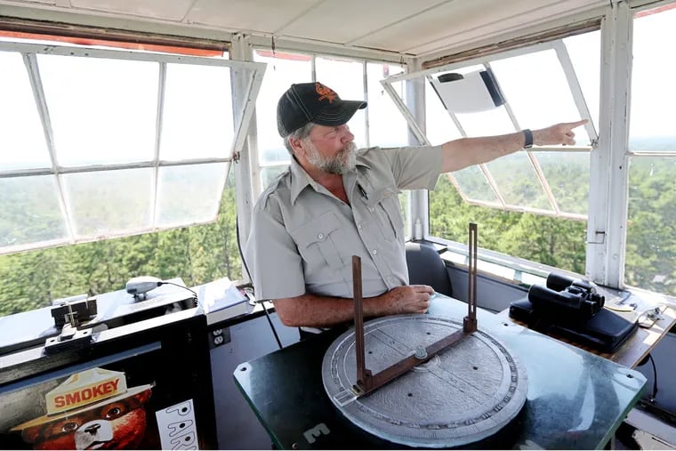 Craig Watson, 62, a retired phone company lineman, has worked part time in the Apple Pie Hill tower for 14 years spotting fires. "This tower is such an important asset to this entire region, so it's very sad that there people who have come here and treated it the way they have," he said.