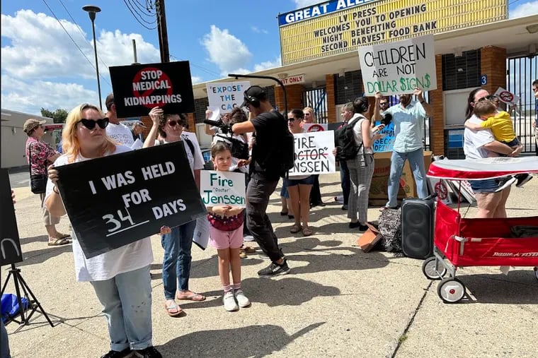 Parents who say doctors at Lehigh Valley Health Network falsely accused them of medically abusing their children protest in Allentown earlier this month.