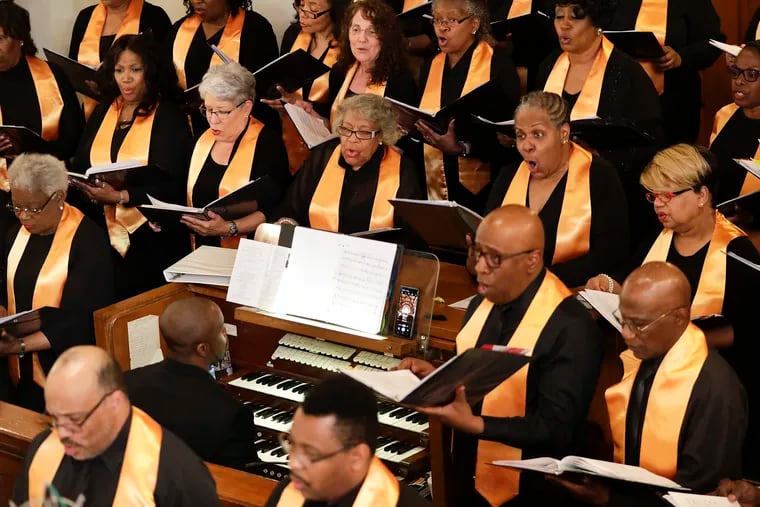 Members of the choir perform the Philadephia Community Mass Saturday at Mother Bethel A.M.E. Church in Society Hill.