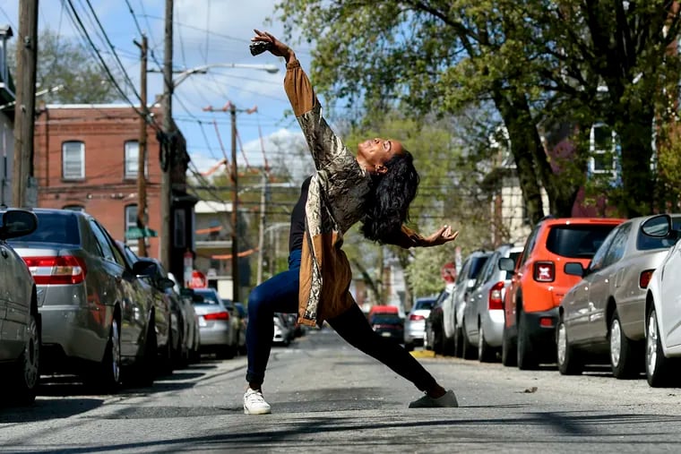 Janine Beckles, a dancer with Philadanco, poses near her home - but not on her porch - as conronavirus home-bound Philly actors, musicians, dancers wonder when they’ll work again.