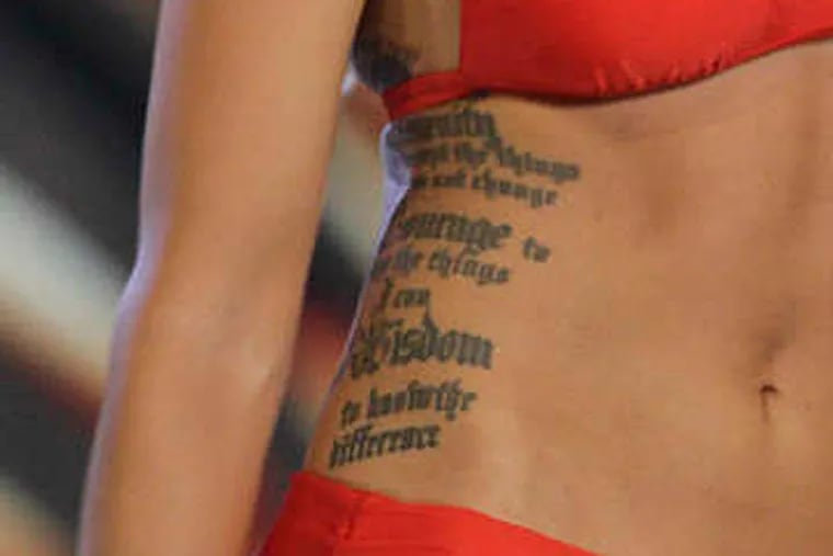 Miss Kansas Theresa Vail - and her tattoo - during the Miss America preliminary competition in Atlantic City on Tuesday. (Steven M. Falk / Staff Photographer)