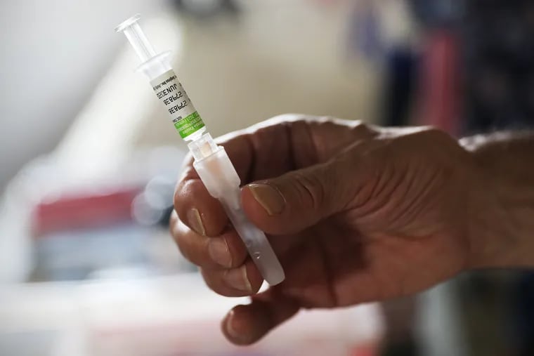 This flu vaccine, given at an October 2020 clinic in South Philadelphia, was designed to protect against strains of flu that were circulating that year. But a new universal flu vaccine, invented at the University of Pennsylvania, might one day protect recipients against all types of flu virus.