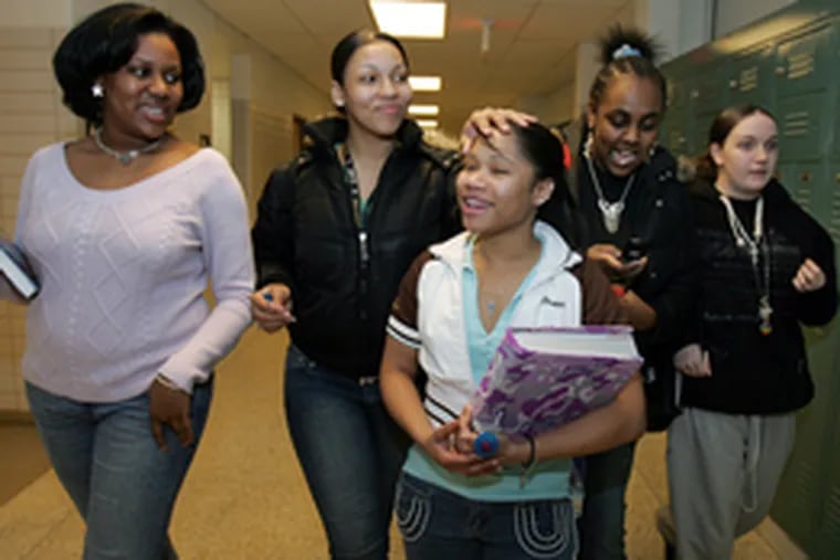 After a meeting of the Black Student Union, Coleman (left) walks with friends (from right) Kaitlyn Campbell, Shaniece Anderson, Devon Lee and Vanity Walls.