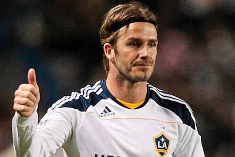 David Beckham will not play Wednesday when the Galaxy visit the Union. (Bret Hartman/AP)