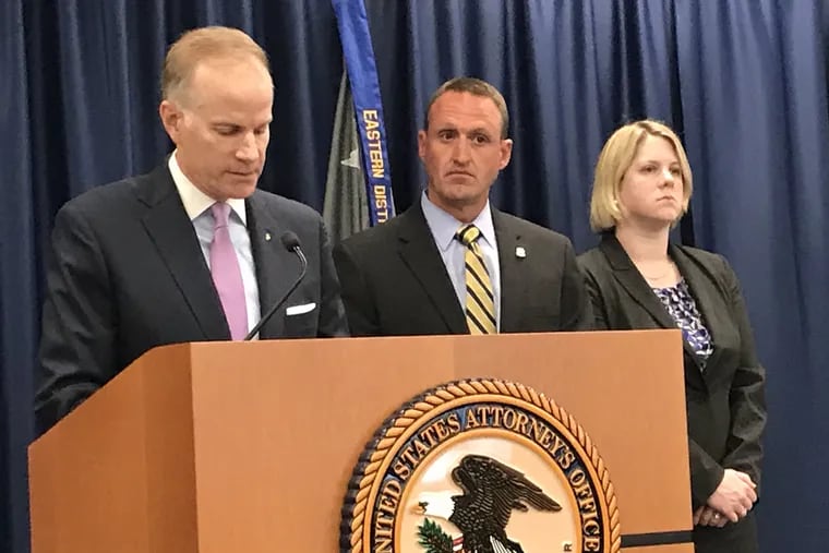 U.S. Attorney William M. McSwain, left, announces charges Tuesday against three Chinese nationals who allegedly recruited a former Montgomery County sheriff's deputy to serve as the main distributor for their online business selling fentanyl through the mail. Also pictured: William Walker, deputy special agent in charge for Homeland Security Investigations (HSI) in Philadelphia, and Assistant U.S. Attorney Clare Putnam Pozos.