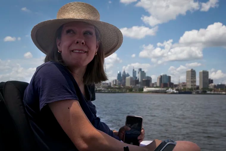 Lauren DeBruicker, an Assistant U.S. Attorney based in Philadelphia, talks to Julia Dorsett as the boat the Impossible Dream passes Philadelphia on the afternoon of Thursday, June 5, 2018.