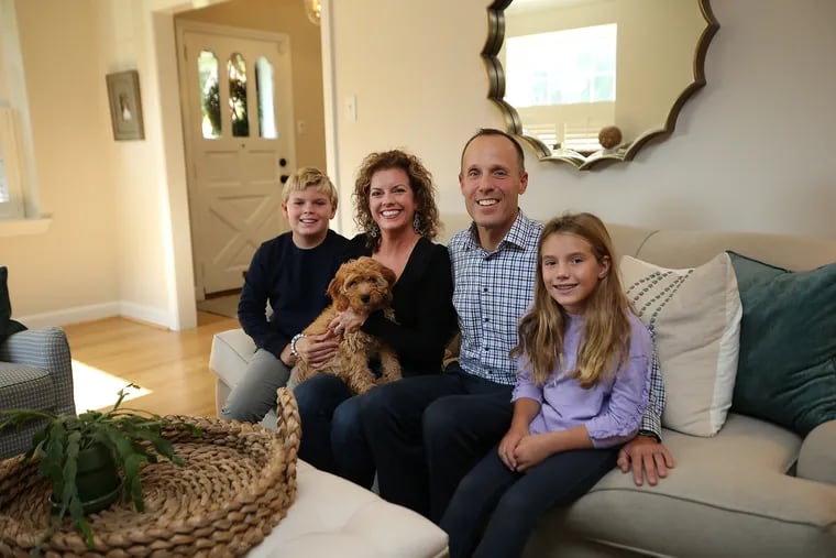 The Klein family — (from left) Connor, Nicole, Kenny, and Charlotte — with their dog Tucker. Kenny calls Havertown "the perfect mix of neighborhood and nature."