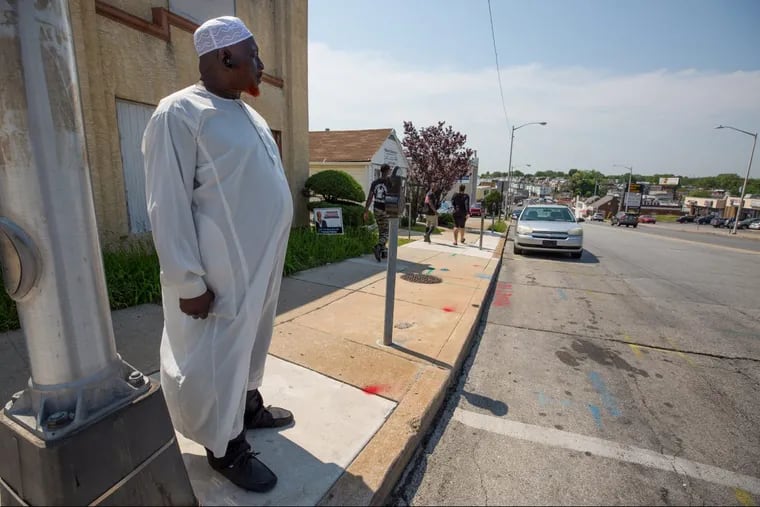 Brother Amin Abdul Aziz, a member of the moon sighting committee of the Majlis Ash Shura, an association of area mosques and imams,  stands at 69th and Walnut Streets where Aziz had planned to look for the new moon that marks the beginning of the holy month of Ramadan, but thunderstorms upended the annual ritual.
