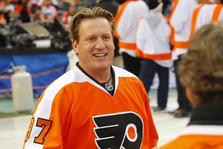 Former Flyers center Jeremy Roenick, seen here during the 2011 Winter Classic Alumni hockey game at Lincoln Financial Field, has been suspended from NBC Sports.