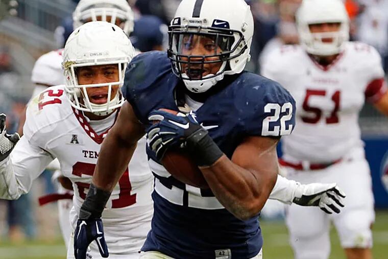 Penn State running back Akeel Lynch (22) runs for a touchdown during the third quarter of an NCAA college football game against Temple in State College, Pa., Saturday, Nov. 15, 2014. (Gene J. Puskar/AP)