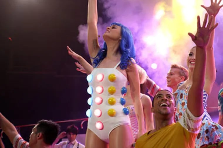 This film image released by Paramount Pictures shows Katy Perry performing with dancers in a scene from her 3D film, "Katy Perry: Part of Me." (AP Photo/Paramount Pictures)