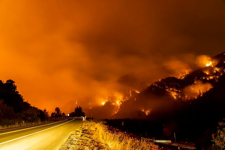 The El Dorado Fire burns a hillside in the San Bernardino National Forest.