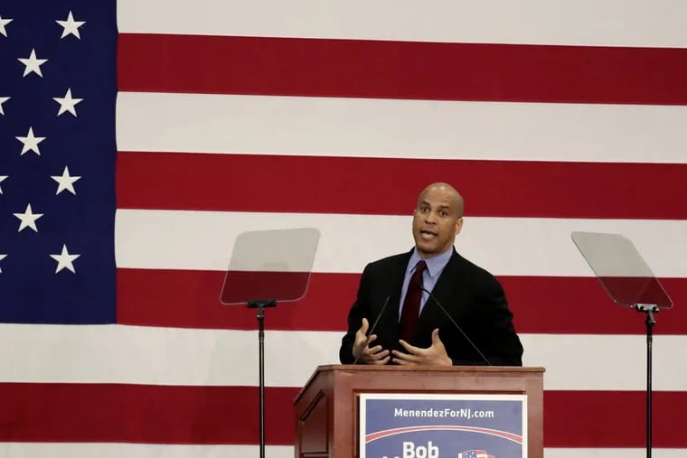 U.S. Sen. Cory Booker speaks during an event kicking off Sen. Bob Menendez's campaign for re-election at Union City High School, Wednesday, March 28, 2018, in Union City, N.J. (AP Photo/Julio Cortez)
