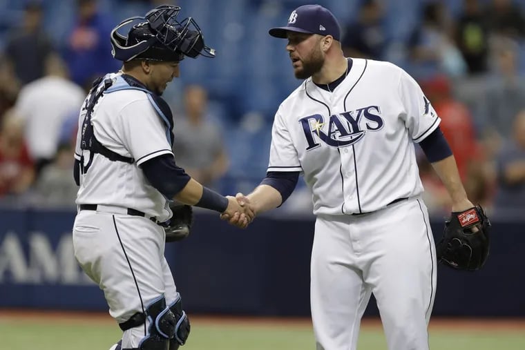 Tommy Hunter (right)  had a 2.61 ERA in 58 2/3 innings with the Tampa Bay Rays last season.