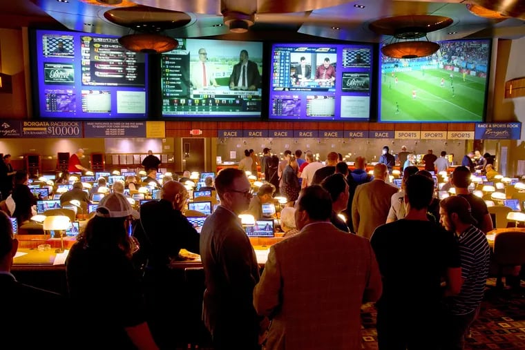 Bettors line up at the Borgata in Atlantic City on  June 14, opening day for sports wagering.