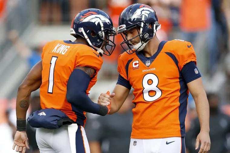 Brandon McManus (right) celebrates the  game-winning field goal with punter Marquette King (1) that has ignited a controversy with FanDuel sports.