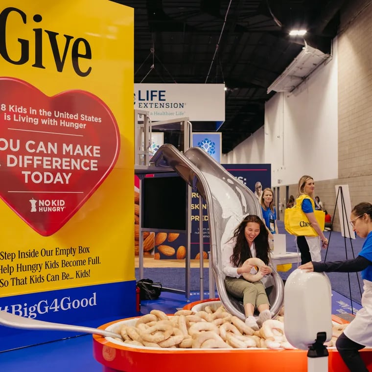 At the Food and Nutrition Conference and Expo in Denver last fall, dietitians waited in line to climb a giant yellow General Mills cereal box and slide into a bowl of plushie Cheerios. MUST CREDIT: Joanna Kulesza for The Washington Post and The Examination