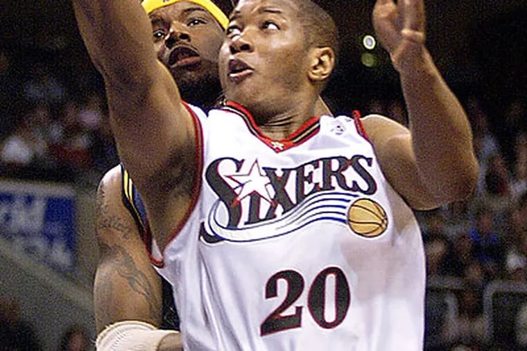 Former 76ers player Eric Snow is back with the team as a television analyst. (H. Rumph Jr/AP file photo)