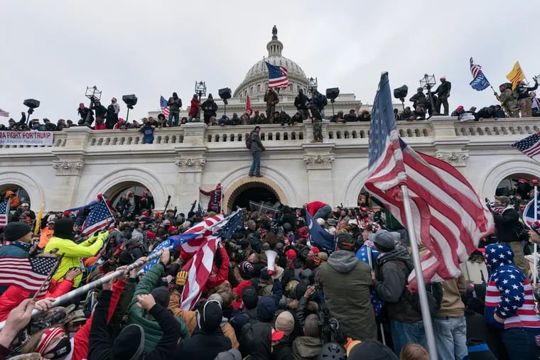 Pro-Trump supporters pushed back against police at the Capitol in Washington on Jan. 6.