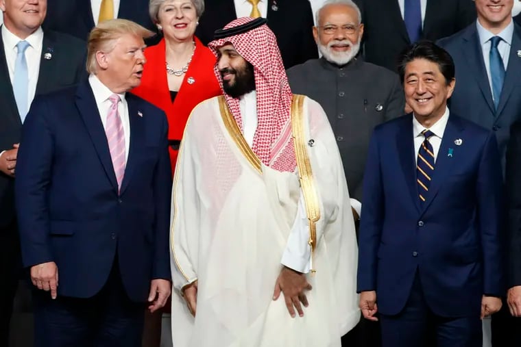 U.S. President Donald Trump speaks with Saudi Arabia's Crown Prince Mohammed bin Salman during a photo session at the G-20 leaders summit in Osaka, Japan, Friday, June 28, 2019.